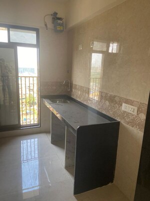 Kitchen in 2 BHK Apartment at Vashi – for Sale