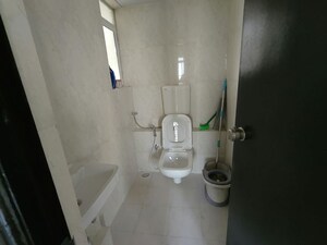 Bathroom in 2 BHK Apartment at Puranik Rumah Bali, Ghodbunder Road – for Rent