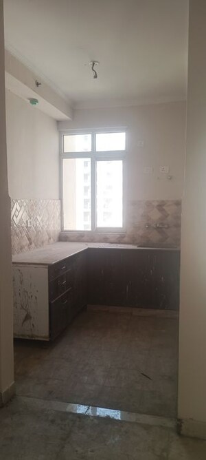 Kitchen in 2 BHK Apartment at Amrapali Kingswood, Sector 4 Greater Noida – for Sale