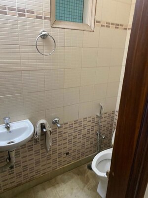 Bathroom in 2 BHK Builder Floor at Kalkaji – for Rent
