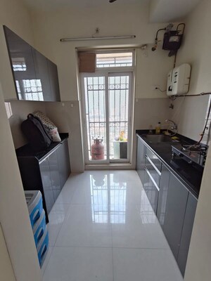 Kitchen in 1 BHK Apartment at Vijay Galaxy, Waghbil – for Rent