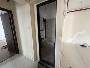 Building Lobby in 2 BHK Apartment at Sheth Avalon, Laxmi Nagar – for Rent