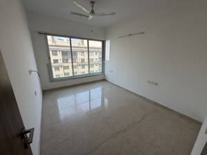 Room in 2 BHK Apartment at Sheth Avalon, Laxmi Nagar – for Rent
