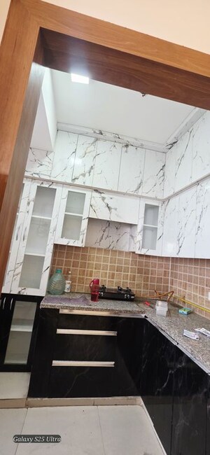 Kitchen in 2 BHK Apartment at Mahagun Mywoods, Sector 16c Greater Noida – for Rent