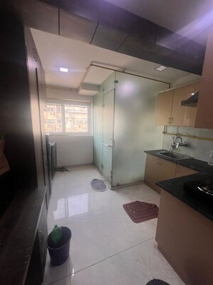 Living Room in Studio Apartment at DLF Capital Greens Phase I And II, Moti Nagar – for Rent