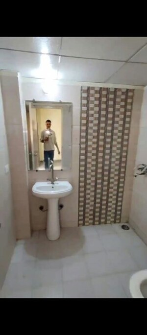 Bathroom in 2 BHK Apartment at Sector 16c Greater Noida – for Rent