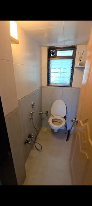 Bathroom in 2 BHK Apartment at Roop Darshani, Juhu Road – for Rent