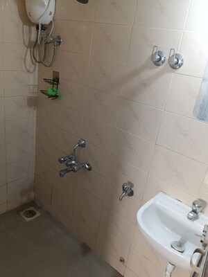 Bathroom in 1 BHK Apartment at Bageshri CHS, Goregaon East – for Rent