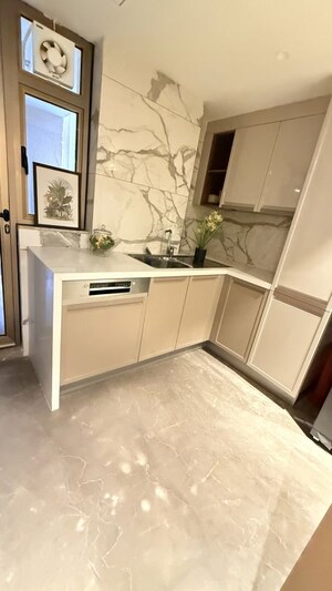 Kitchen in 3.5 BHK Apartment at Tarc Tripundra, Kapashera – for Sale