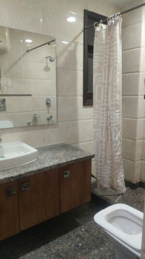 Bathroom in 3 BHK Builder Floor at Kalkaji – for Rent