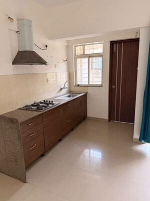 Kitchen in 2 BHK Apartment at Gera Park View, Kharadi – for Rent