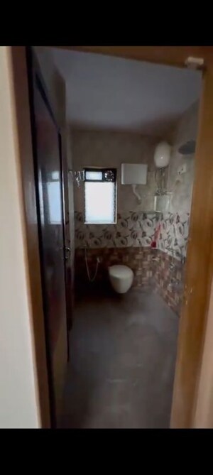 Bathroom in 2 BHK Apartment at Aangan CHS, Kandivali East – for Rent