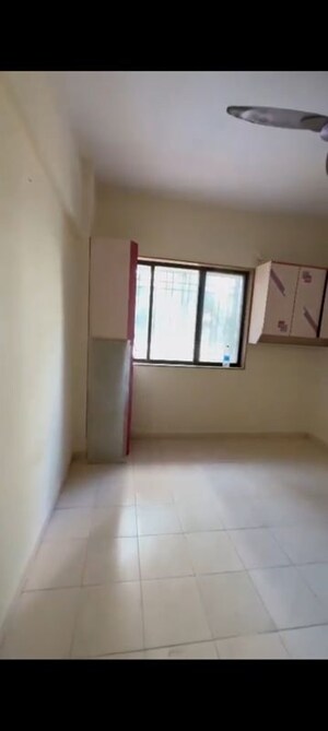 Room in 2 BHK Apartment at Aangan CHS, Kandivali East – for Rent
