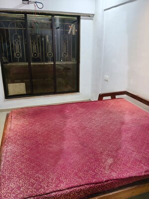 Bedroom in 2 BHK Apartment at Jay Surabhi Aparment, Kanakia Road – for Rent