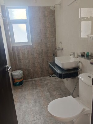 Bathroom in 2 BHK Apartment at Shri Radha Aqua Garden, Sector 16b Greater Noida – for Rent