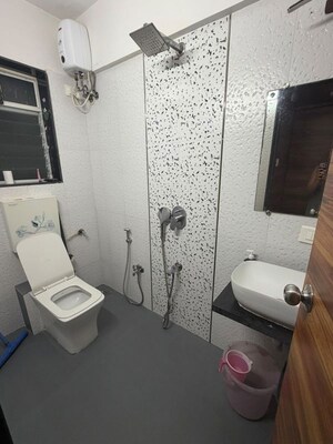 Bathroom in 1 BHK Apartment at Spring Grove Uno Society, Kandivali East – for Rent