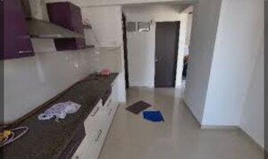 Kitchen in 1.5 BHK Apartment at Puranik Rumah Bali, Ghodbunder Road – for Rent