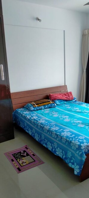Bedroom in 2 BHK Apartment at Karia Konark Orchid, Wagholi – for Rent