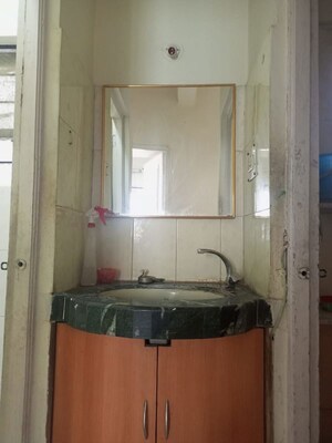 Bathroom in 2 BHK Apartment at Morya Gosavi Raj Park, Chinchwad – for Rent