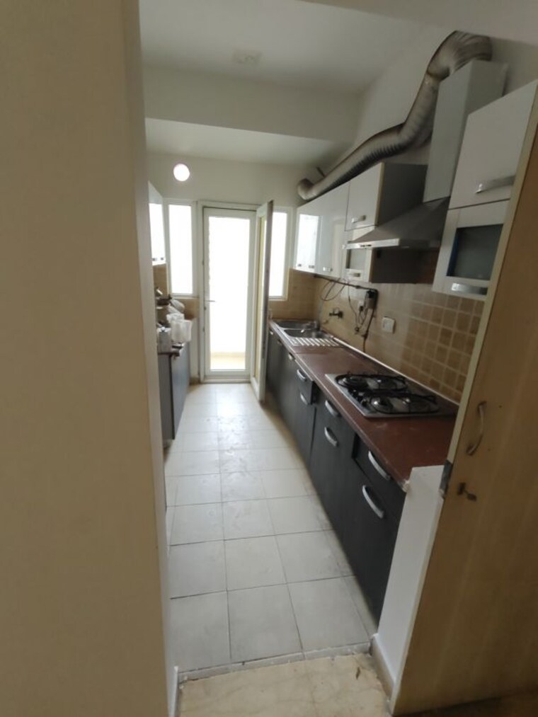 Kitchen, mahagun-moderne 2.5 Bedroom 1250 Sq.Ft. Apartment In Sector 78 Noida 10740056