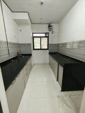 Kitchen in 2 BHK Apartment at Lodha Casa Maxima, Mira Road – for Rent