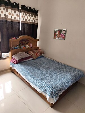 Bedroom in 2 BHK Apartment at Rohan Silver Gracia, Ravet – for Rent
