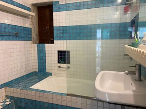 Bathroom in 2 BHK Apartment at Hashu Niwas, Bandra West – for Rent
