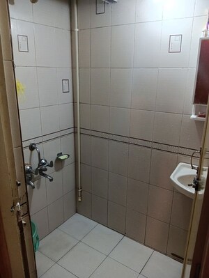 Bathroom in 1 BHK Apartment at Zainab Tower, Madanpura – for Sale