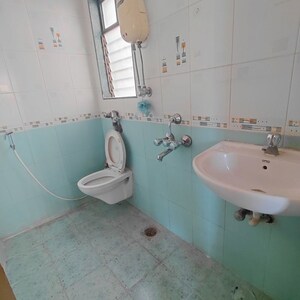 Bathroom in 1 BHK Apartment at Sadguru Complex II, Goregaon West – for Rent