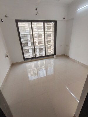 Bedroom in 2 BHK Apartment at Sethia Kalpavruksh Heights, Kandivali West – for Rent