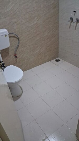 Bathroom in 2 BHK Apartment at Signature Global Orchard Avenue, Sector 93 – for Sale
