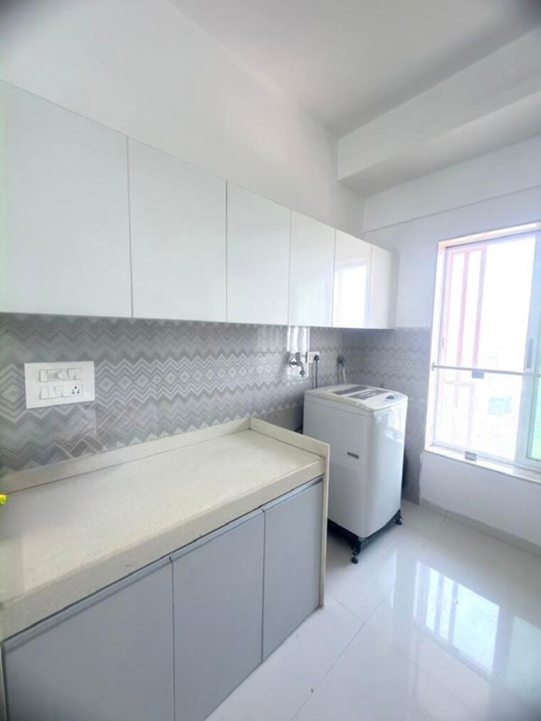 Kitchen, romell-aether 2 Bedroom 713 Sq.Ft. Apartment In Goregaon East Mumbai 10740390