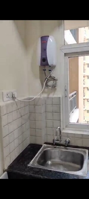 Bathroom in 2 BHK Apartment at Signature Global Orchard Avenue, Sector 93 – for Sale