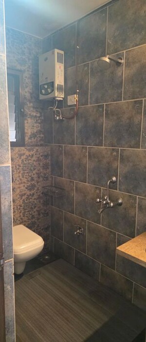 Bathroom in 3 BHK Apartment at Hyde Park Galaxy, Manpada – for Rent