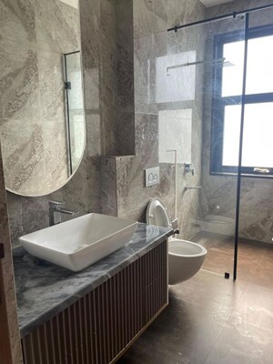 Bathroom in 4 BHK Apartment at Dlf City Phase 3 – for Rent