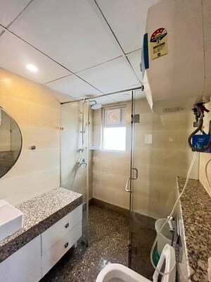 Washroom in 3 BHK Apartment at ABA Cleo County, Sector 121 – for Rent