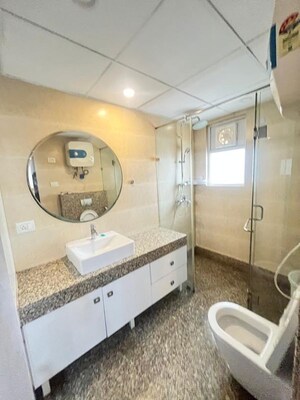 Bathroom in 3 BHK Apartment at ABA Cleo County, Sector 121 – for Rent