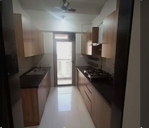 Kitchen in 3 BHK Apartment at Lodha Splendora, Ghodbunder Road – for Sale