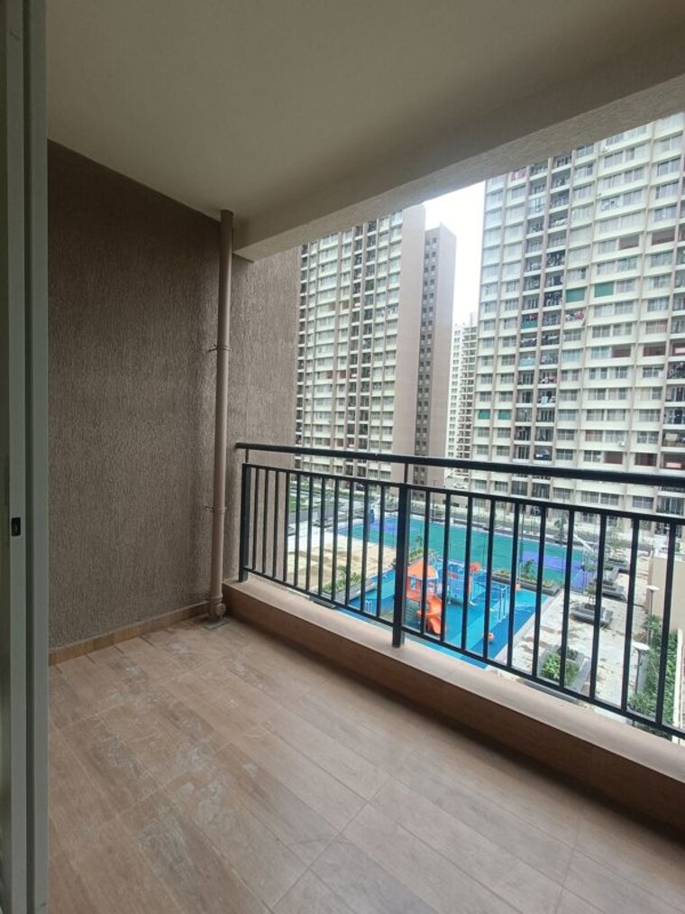 Balcony, kolte-patil-life-republic-echoes 2 Bedroom 738 Sq.Ft. Apartment In Hinjewadi Pune 10740488