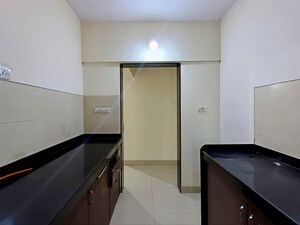 Kitchen in 2 BHK Apartment at Rustomjee Urbania Atelier, Thane West – for Rent
