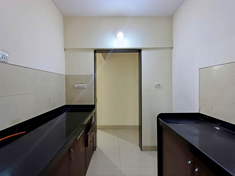 Kitchen, rustomjee-urbania-atelier 2 Bedroom 558 Sq.Ft. Apartment In Thane West Thane 10740479
