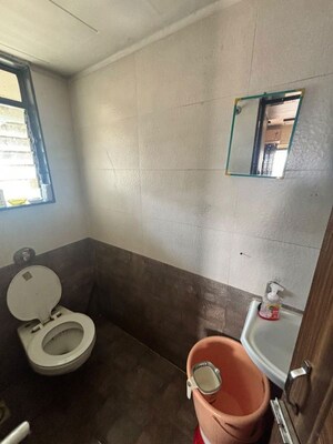 Bathroom in 2 BHK Apartment at Atlanta Manor, Malad East – for Rent
