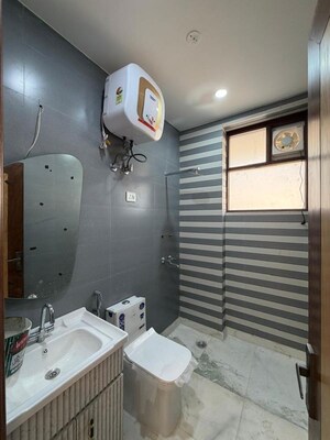 Bathroom in 3.5 BHK Builder Floor at Dlf Phase ii – for Rent