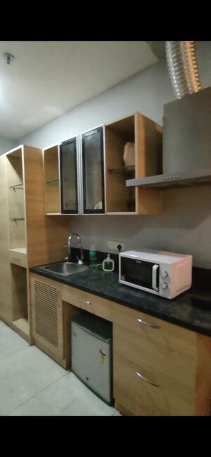 Kitchen in Studio Apartment at Gaur City Mall, Sector 4 Greater Noida – for Rent