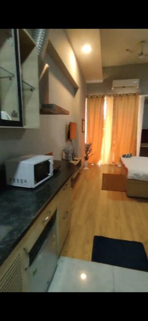 Kitchen in Studio Apartment at Gaur City Mall, Sector 4 Greater Noida – for Rent