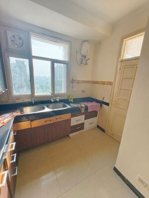 Kitchen in 3 BHK Apartment at CGHS HEWO Apartments, Sector 56 – for Rent
