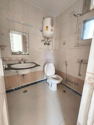 Bathroom in 3 BHK Apartment at CGHS HEWO Apartments, Sector 56 – for Rent
