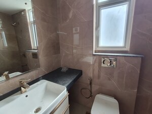 Bathroom in 3 BHK Apartment at Smart World Orchard, Sector 61 – for Rent