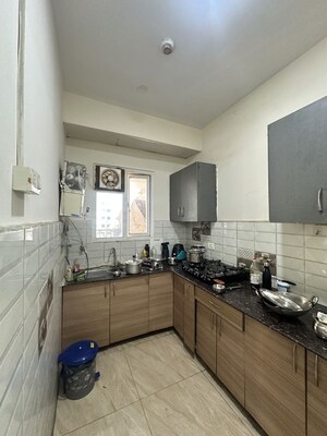 Kitchen in 2 BHK Apartment at Gaur City 7th Avenue, Sector 4 Greater Noida – for Rent