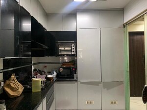 Kitchen in 2 BHK Apartment at Ivory Towers CHS LTD, Bhakti Park – for Sale